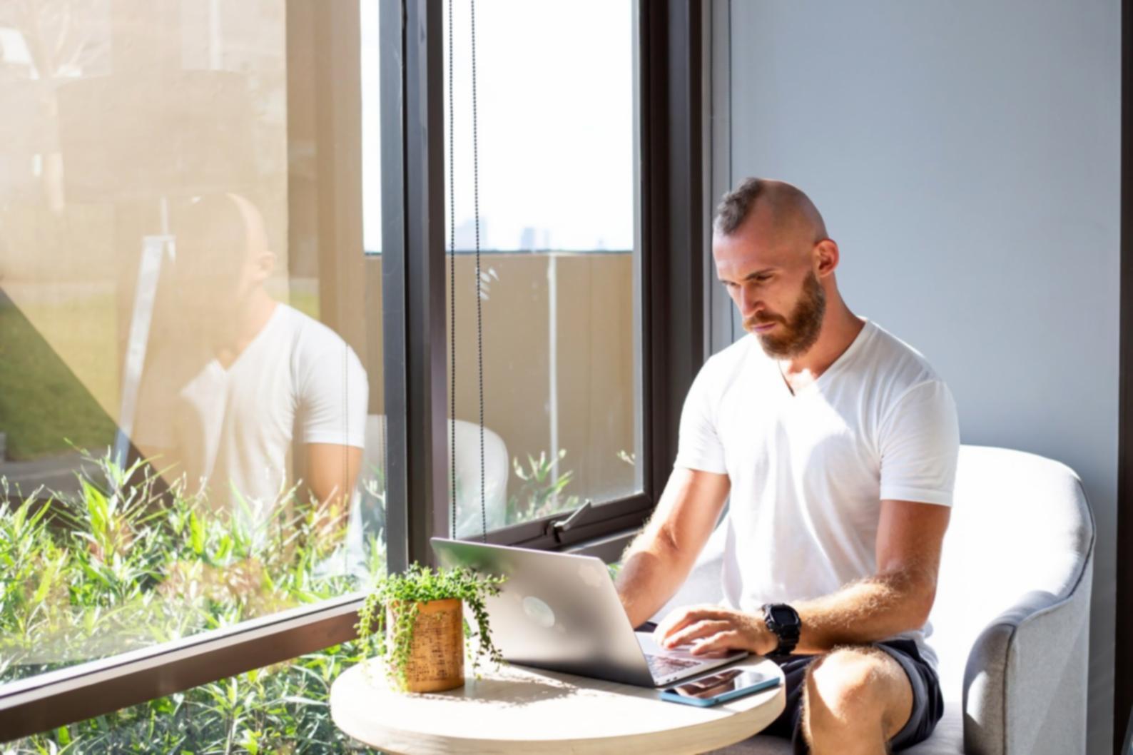 Business professional reviewing automated financial reports and analytics